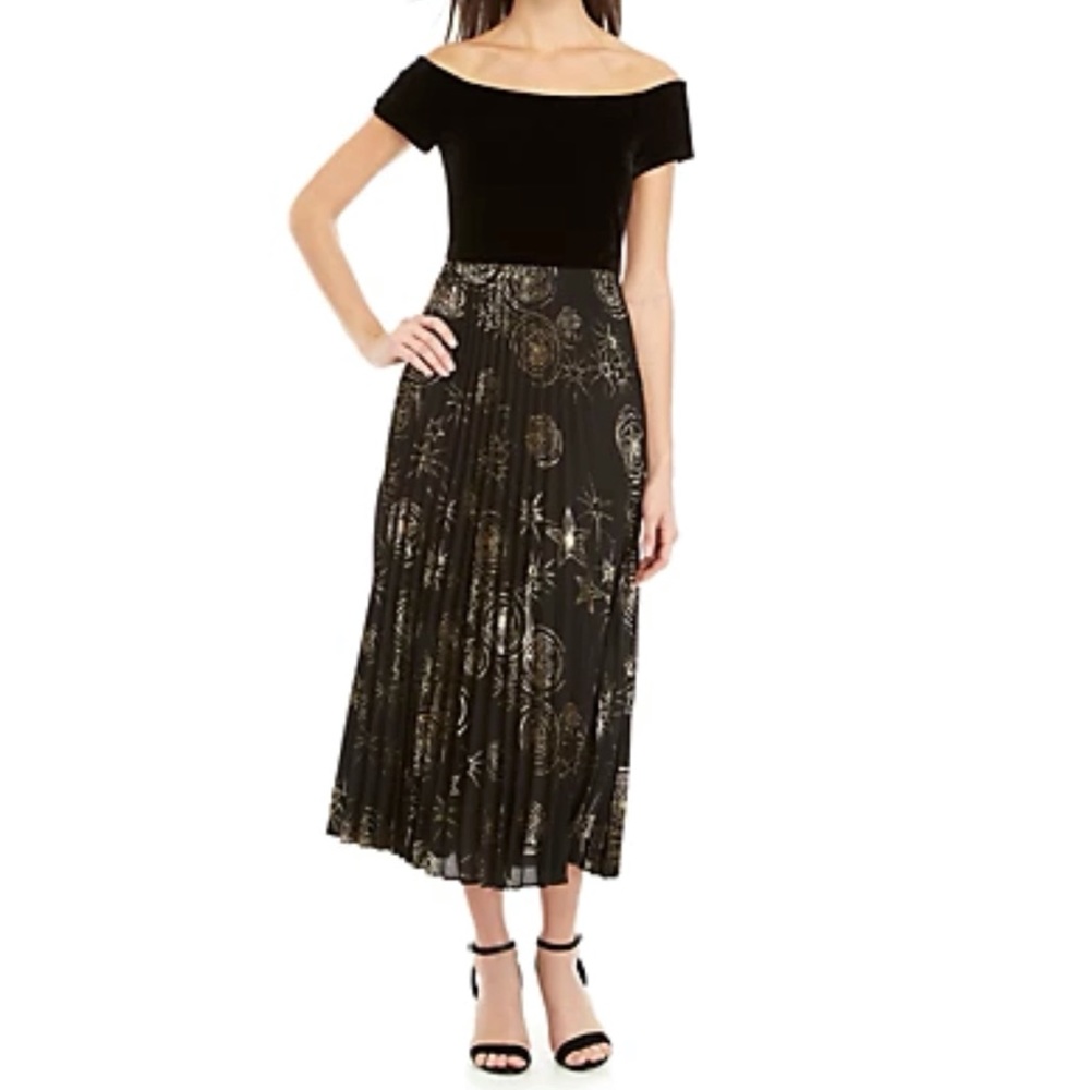 Off the shoulder velvet ruffle dress.